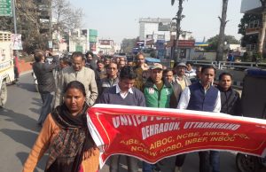 Bank employees stage protest against merger plan