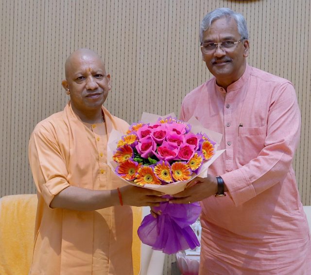 Trivendra Rawat meeting Yogi Adityanath