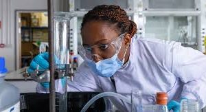 Scientist at the Laboratory, and Believer at Home