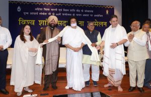 Gov attends ‘World Peace Conference’, recalls teachings of Acharya Lokesh Muni