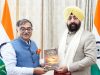 Tarun Vijay presents his book Saffron Surge to Governor