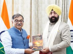 Tarun Vijay presents his book Saffron Surge to Governor